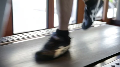 Man running on treadmill Stock Footage 103799761