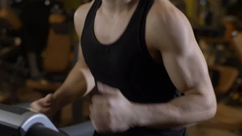 Man running on a treadmill Stock Footage 107485512