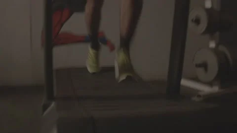Man Running on a Treadmill Stock Footage 146985769