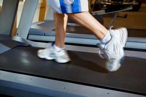 Man running on treadmill Stock Photos