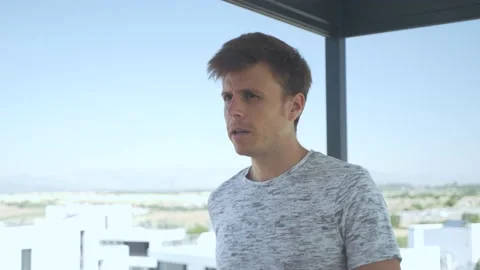 Man running with a treadmill on a rooftop Video stock 170885321