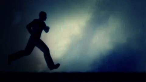Man Running Under a Storm and Lightning - Loop Video stock 62470359
