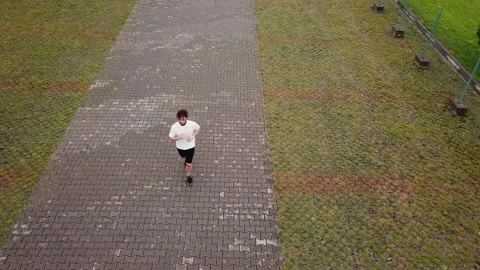 A man running a view from a height Video stock 161660488