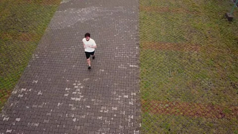 A man running a view from a height Stock Footage 161746940