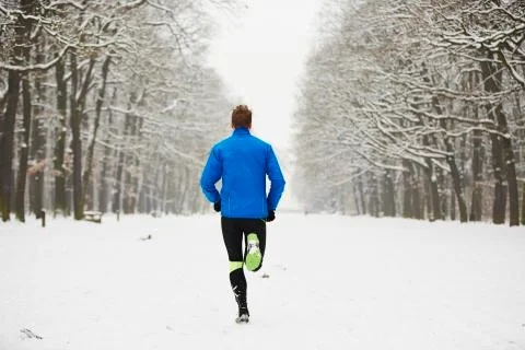 Man running in winter 写真素材
