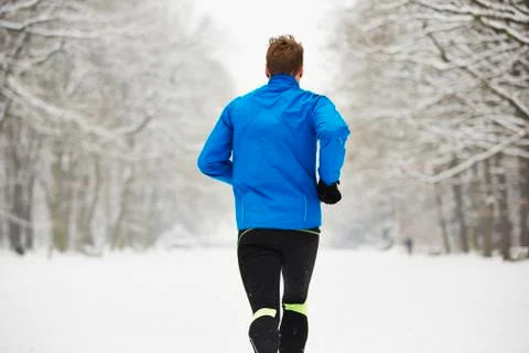 Man running in winter 写真素材