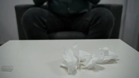Man with runny nose using nasal spray for treatment sitting in office.  Stock Footage 270522061