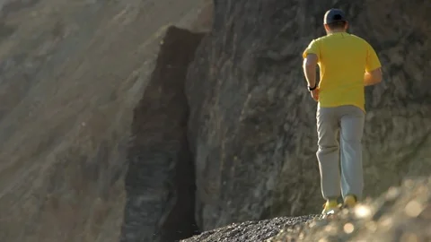 Man runs along the coast Stock Footage 101971499