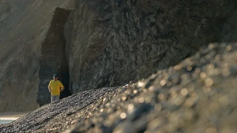 Man runs along the coast Stock Footage 101973685