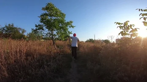 A man runs along the path for all his strength Stock Footage 114564279