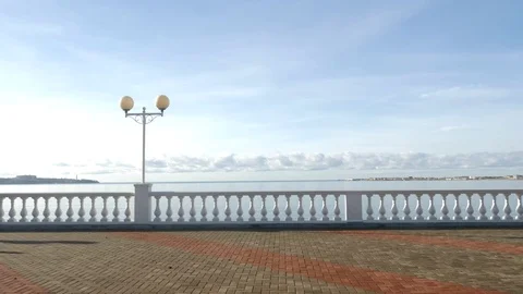 A man runs along the seafront. 4k, slow motion. Stock Footage 82052477