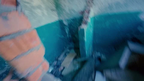 A man runs away from danger in a destroyed building. Stock Footage 313359519