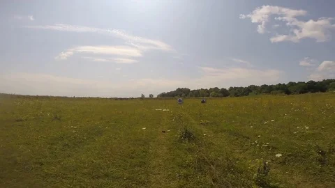 A man runs to a combat target to look at the result shots of a pistol. Target Stock Footage 125493228