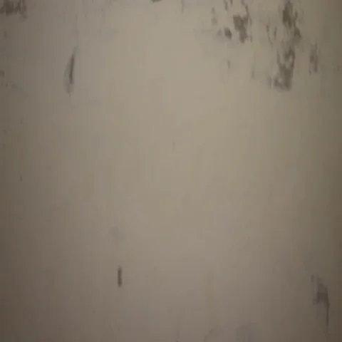 Man runs in front of the camera on a white background with blue effect Stock-Footage 69550116