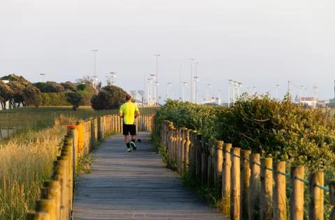 Man Runs on Pathway Stock Photos