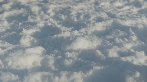 A man runs sneakers close-up steps in the snow 库存影片 102281337