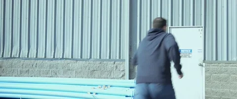 Man Runs Through Building | SuperDad Collection Vídeo Stock 169243391