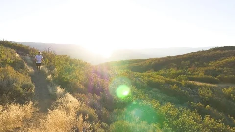 Man Runs Through Trail And Toward Camera Stock Footage 78988373