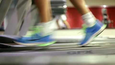 Man runs on treadmill Video stock 128813869