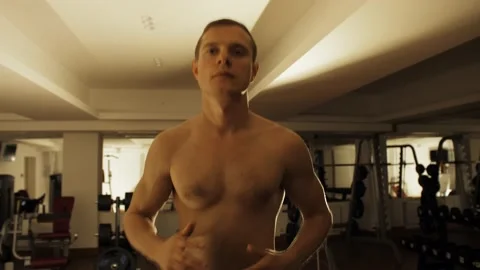 Man runs on a treadmill Stock Footage 140995862