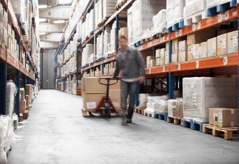 Man, rush or boxes on pallet jack with inventory, distribution management or Stock Photos