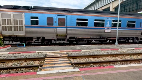 Man Rushing to Catch Train in Kanchanaburi Stock Footage 306123471
