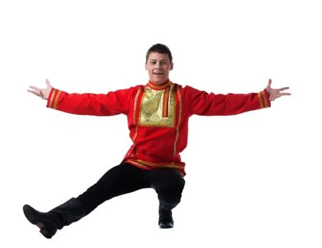 Man in russian costume performing dance Stock Photos