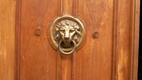 A man s hand opens the door, a close-up photo. The hand holds onto the antique Stock Footage 102719329