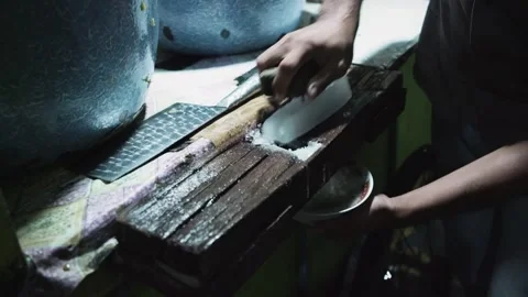 Man s hands make shaved ice cubes. Видео 253964596