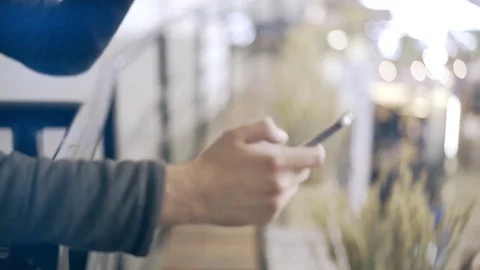 Man s hands with a smartphone and a coffee to go 스톡 동영상 80965711