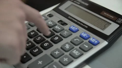 The man said on the calculator. close-up. Stock Footage 51756427