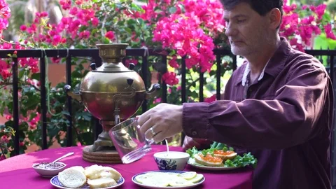Man Samovar Tea 1 Stock Footage 77359331
