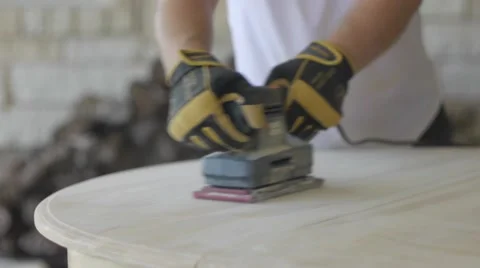 Man Sanding Table Stock Footage 65138539