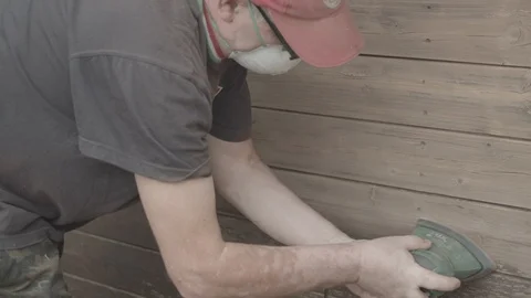 Man Sanding Wooded Wall Using Hand Sander Stock Footage 116560079