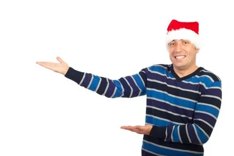 Man with santa hat making presentation Stock Photos