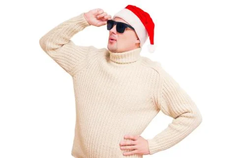 Man in Santa's heading and sunglasses. Stock Photos