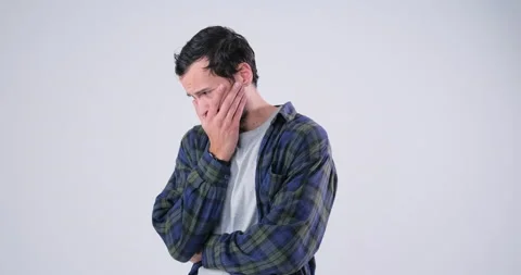 Man saw disgusting image over white background Stock Footage 143942502