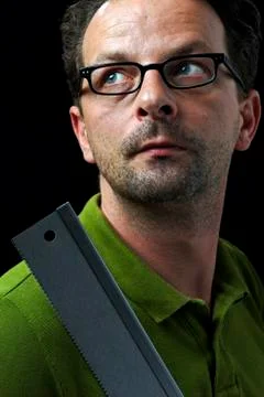 A Man with a saw Stock Photos