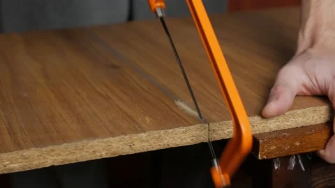 A Man Sawing A Board Closeup Stock Footage 144857873
