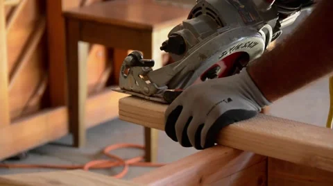 Man sawing boards Stock Footage 49661892
