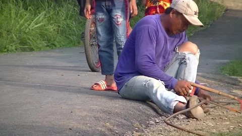 A Man Is Sawing An Iron Video stock 204055776