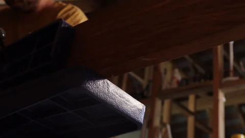 Man sawing wood on a jointer in a home workshop 스톡 동영상 281164553