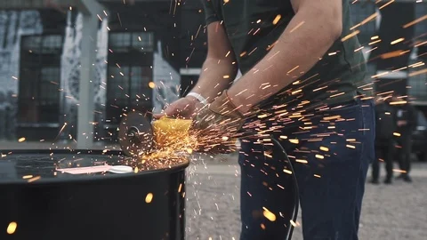 The Man Saws Angular Grinding Machine Iron Details Sparks From Angular 120 fps Stock-Footage 117109370