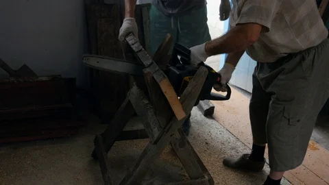 Man saws a board Stock-Footage 80191971
