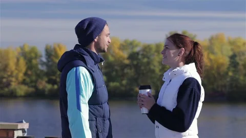The man says goodbye after jogging with his girlfriend Video stock 252675983