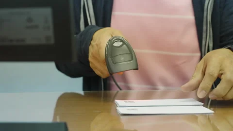 Man scan for reading barcode for transfer data to computer Stock Footage 172342342