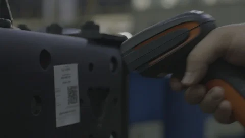 A man scanning a barcode, buying and selling concept. Scene. Close up of hand Vidéo 127569760