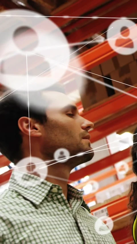 Man scanning warehouse racking and activating user-icon network overlay for Stock Footage 331198967