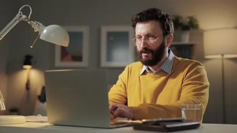 Man is scared, terrified, aghast emotion. Frightened bearded man with glasses in Stock Footage 170472660