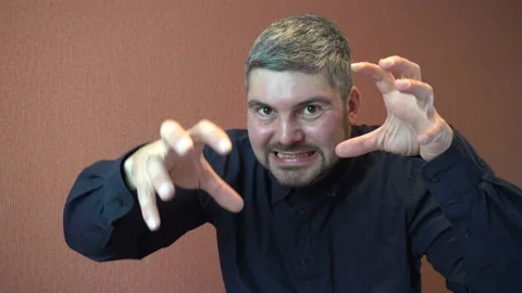 A man scares the viewer 4K Stock Footage 87816741
